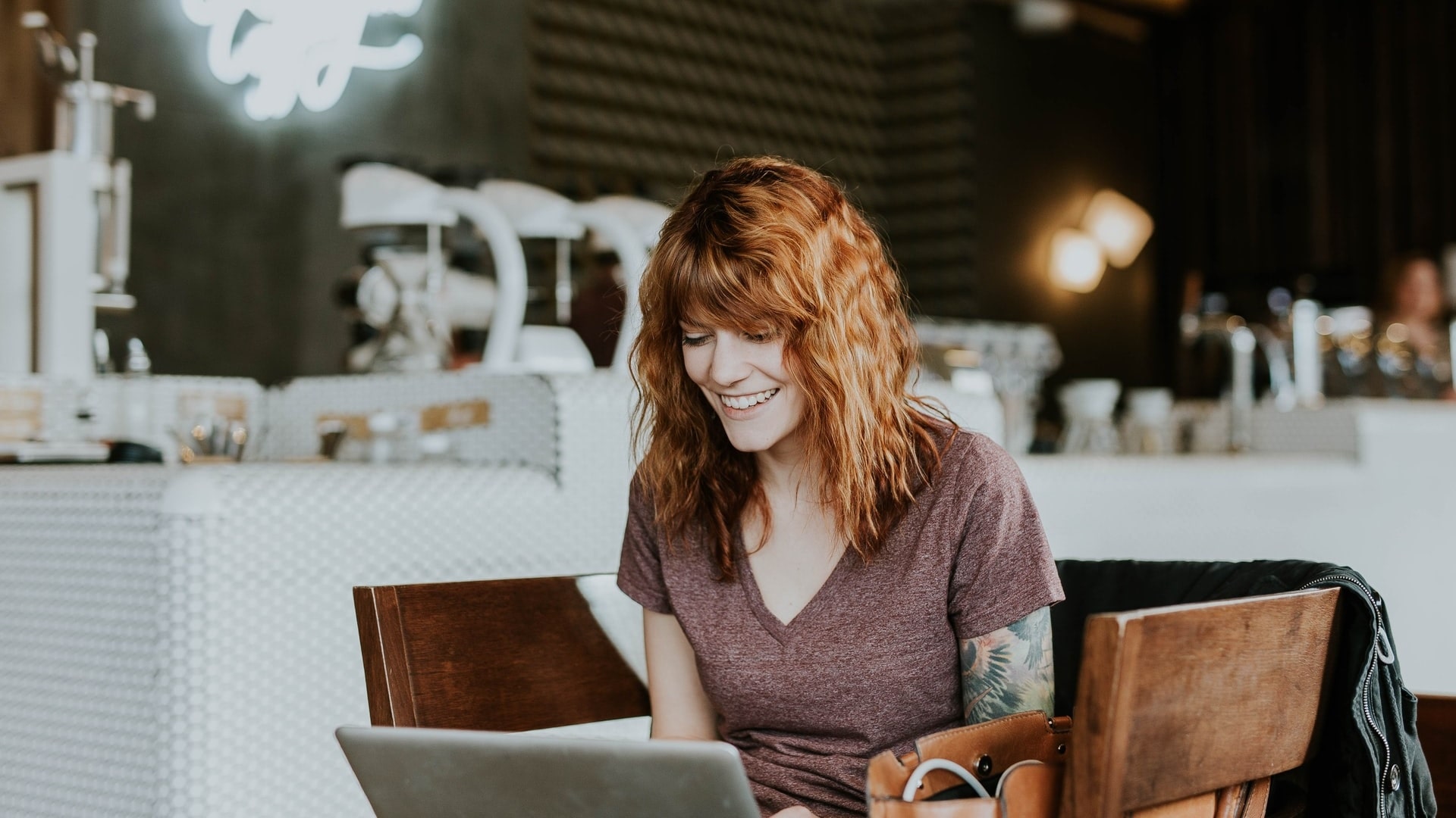 Women smiling in front of a computer Women smiling in front of a computer